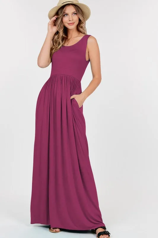 Fuchsia Sleeveless Maxi Dress With Empire Waist Shirring And Pockets